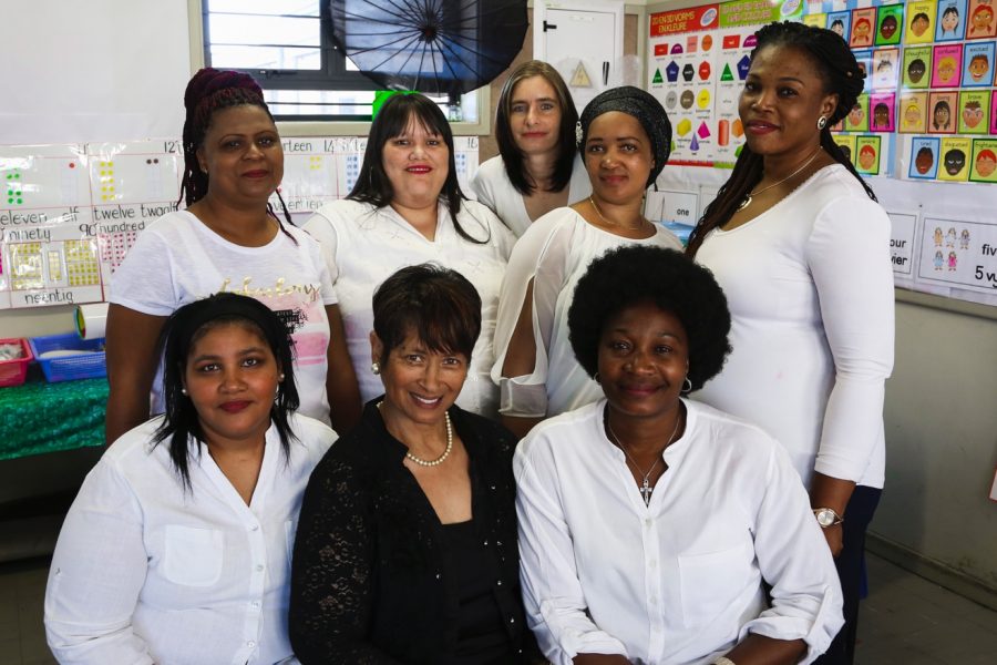 MathMoms (in white) with the MathMentor and director at Valhalla Primary. From left to right. Standing: Susanne Blou, Chevonne Groenemeyer (both completed ECD Courses at Northlink College at the end of 2020), Marlene Batt (found permanent employment), Maria Amram and Laurance Mtambo. Seated: Denise Sauls (MomMentor), Bertha Losper (MathMentor and Director) and Nene Omena.